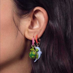 Brand new Man Repeller dolphin and turtle earrings